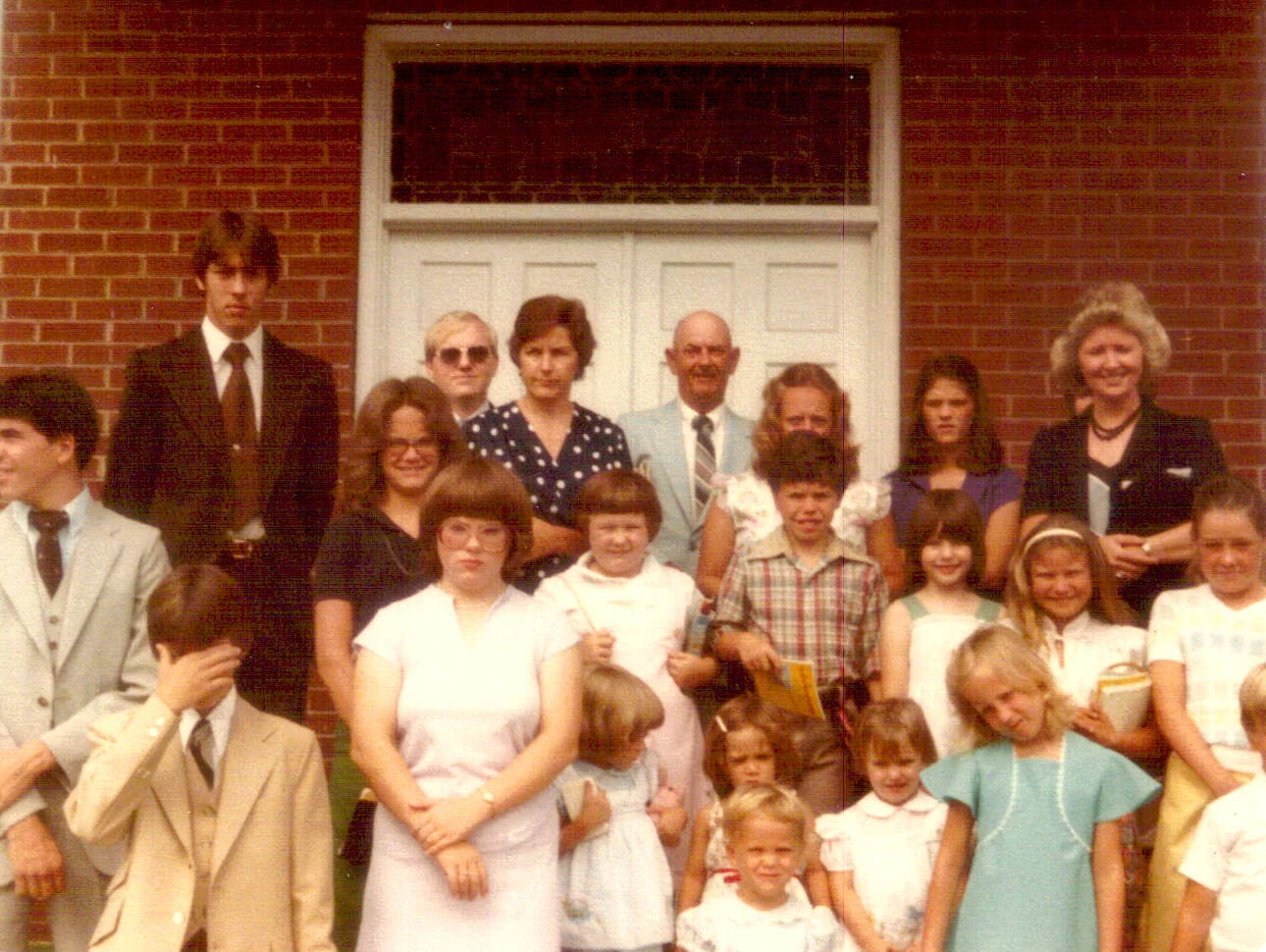 Children and teachers gathered on the church steps during Vacation Bible School.