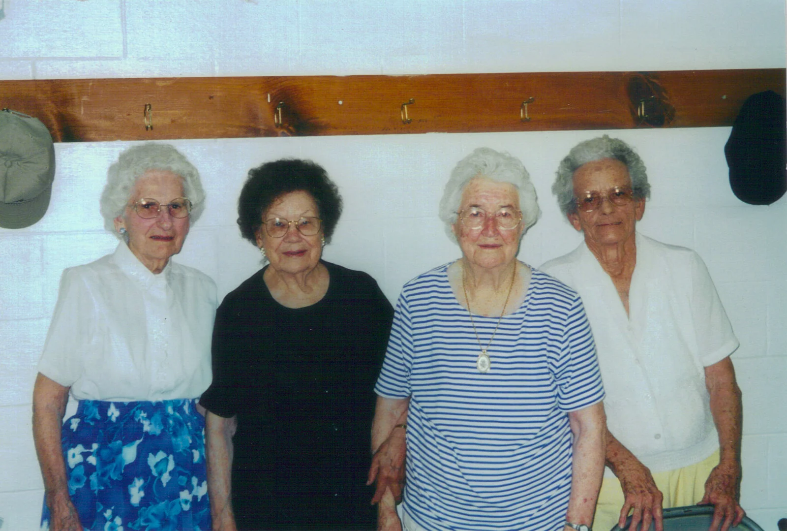 Four Rawls Baptist Church members sharing a moment of fellowship.