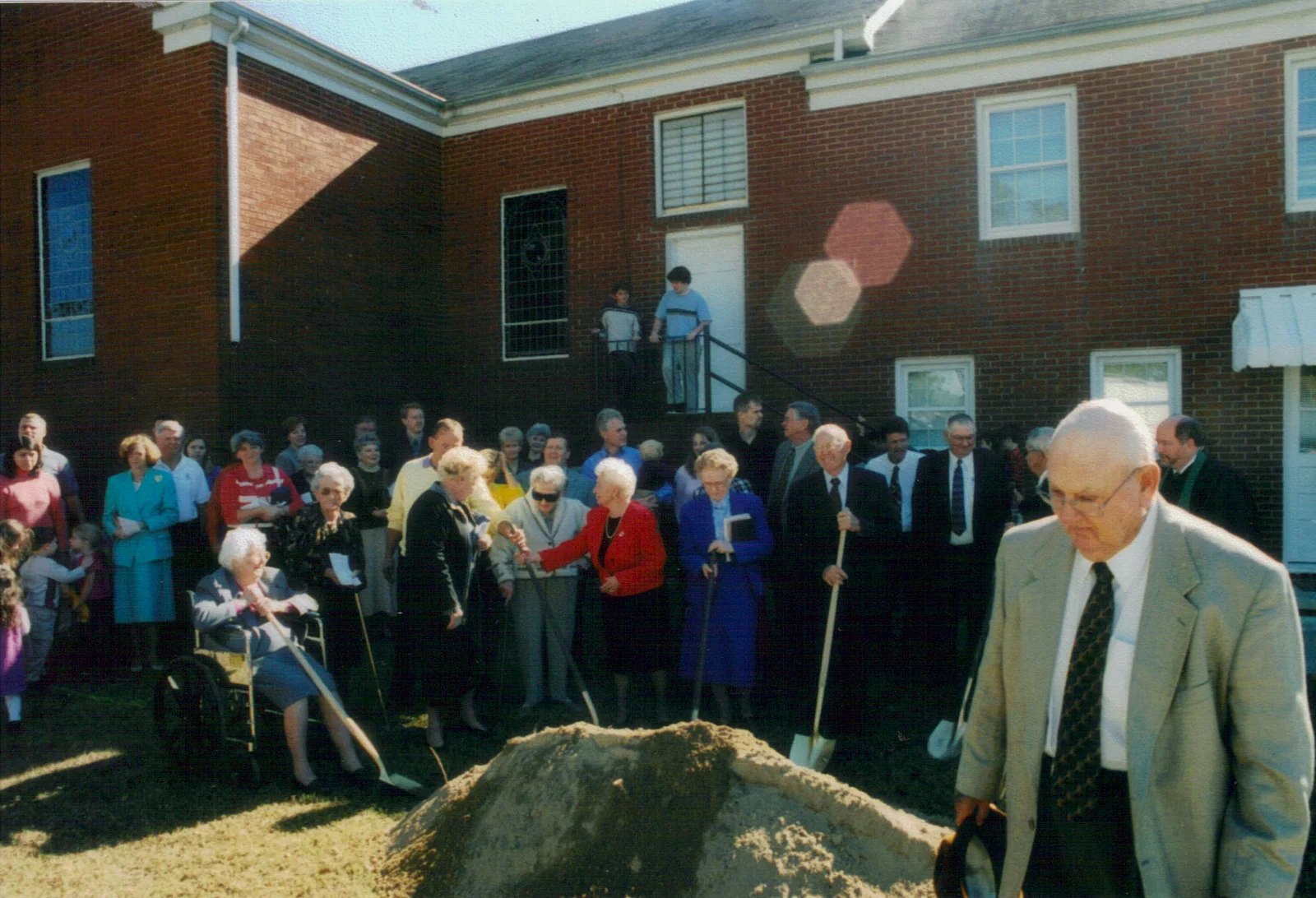 Members gathered for the groundbreaking ceremony for the new fellowship hall and classroom addition.