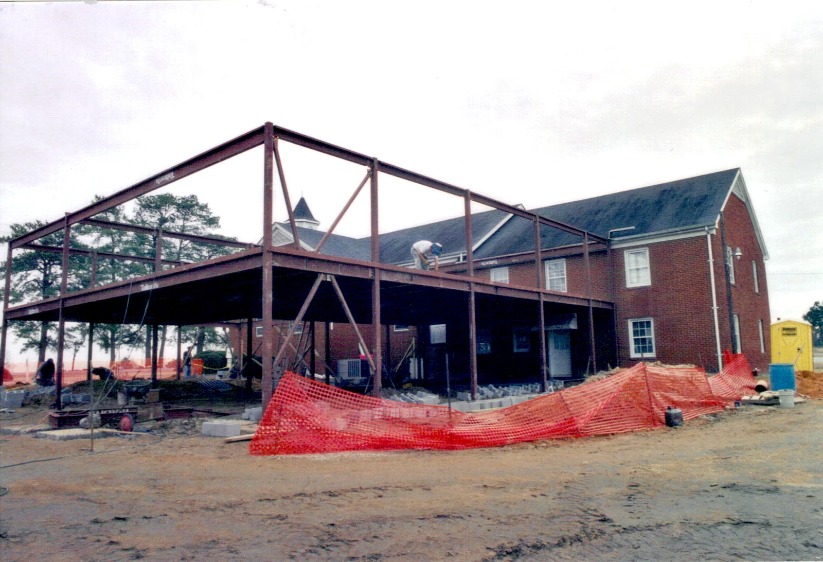 Steel framing rising beside the sanctuary for the new addition.