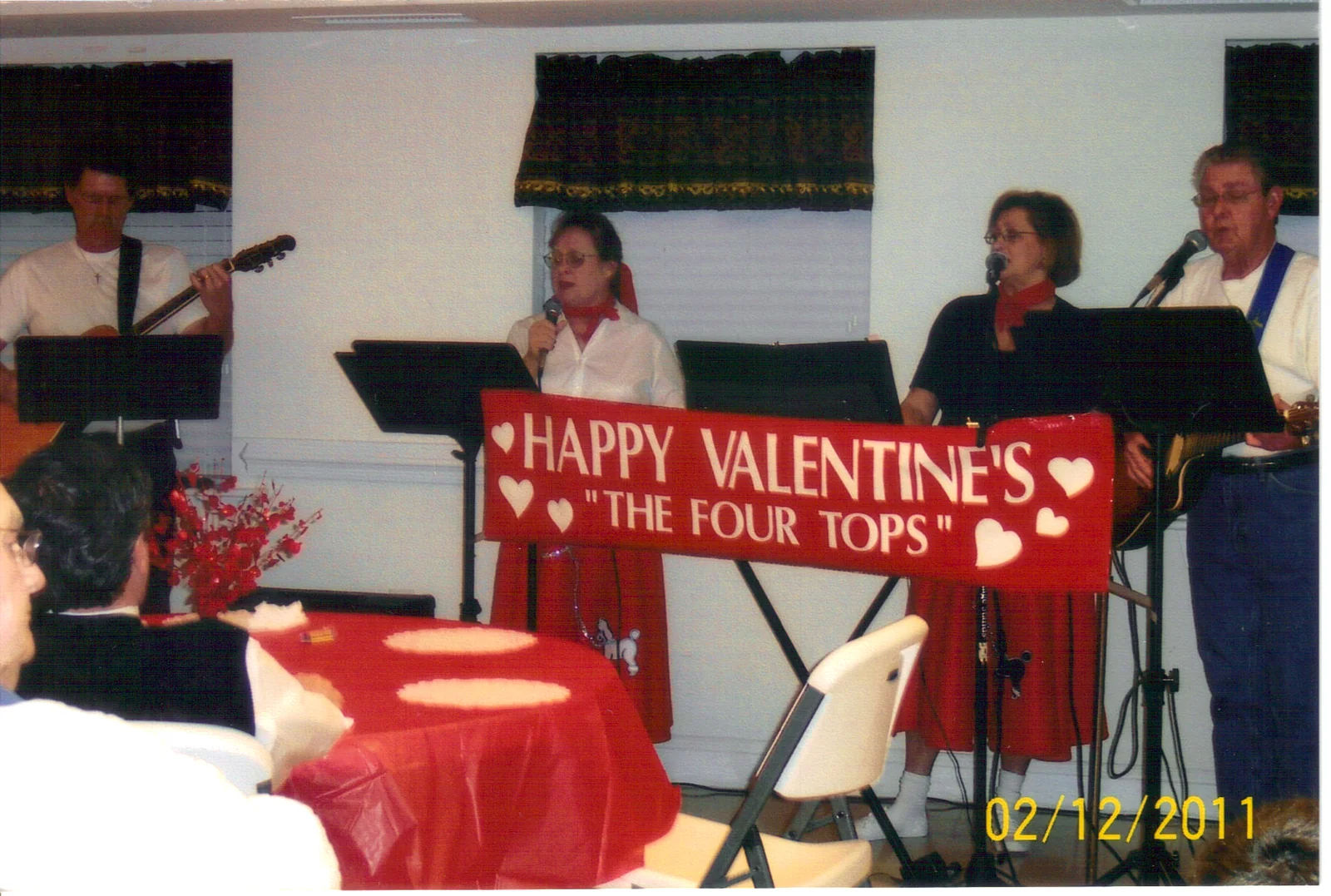Church members sharing live music and fellowship during the Valentine’s Dinner.