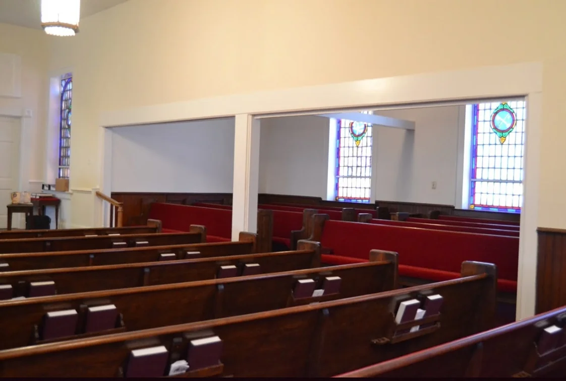 A side view toward the front of the sanctuary before renovation.
