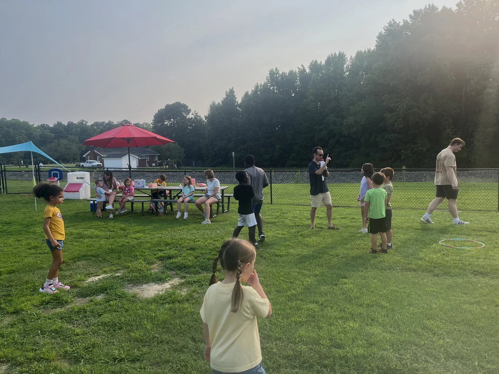 Children spending time together outdoors during Backyard Bible Club.