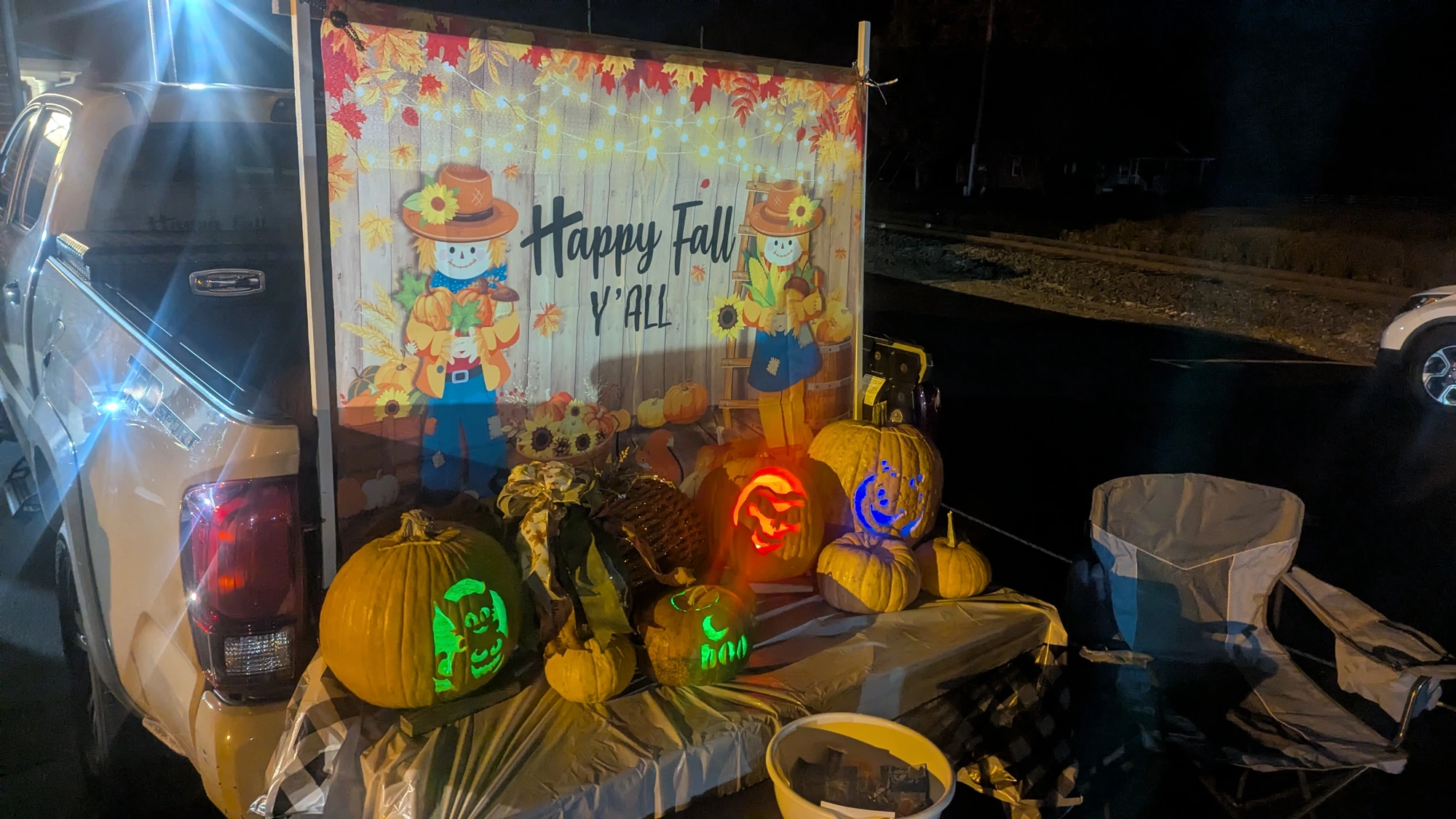 A fall-themed decorated trunk with illuminated pumpkins at Rawls Baptist Church Trunk or Treat.