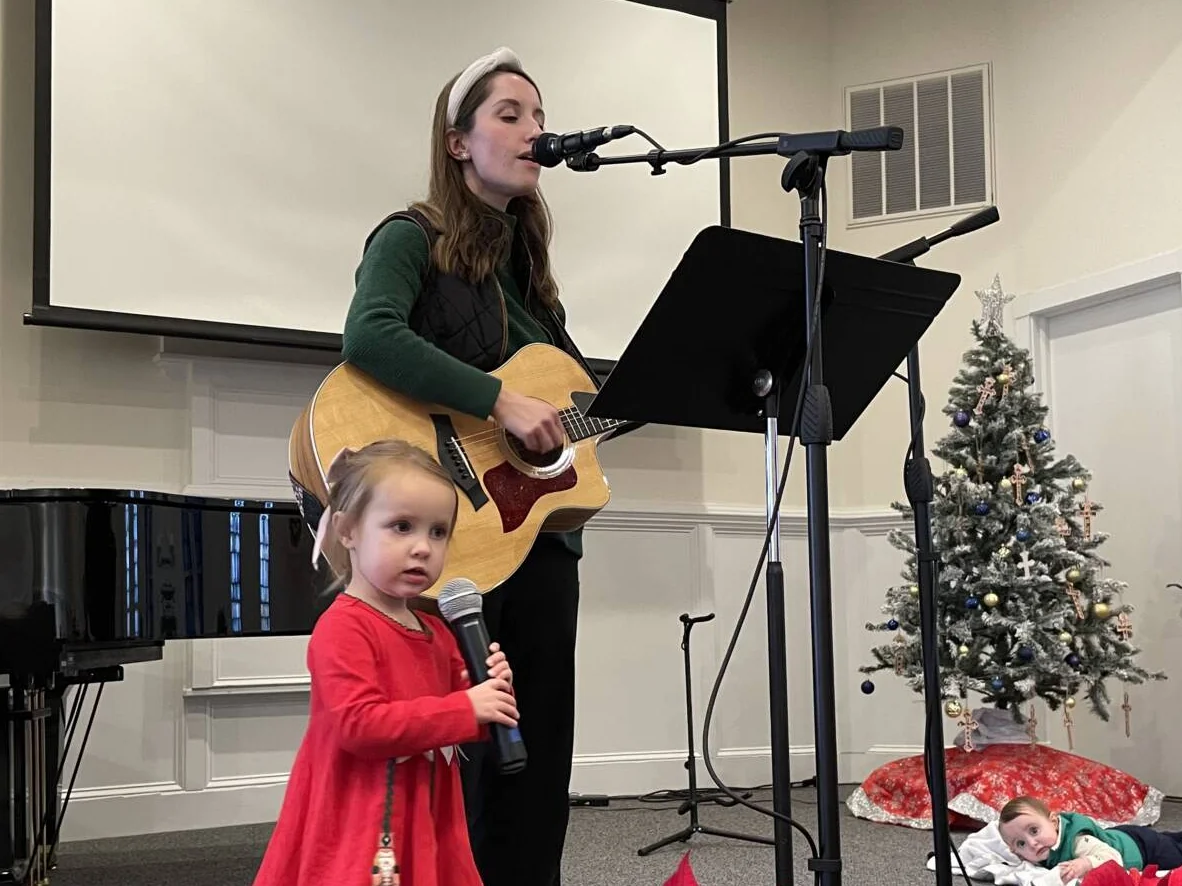 Susanna Gaster leading worship with children at Rawls Baptist Church.