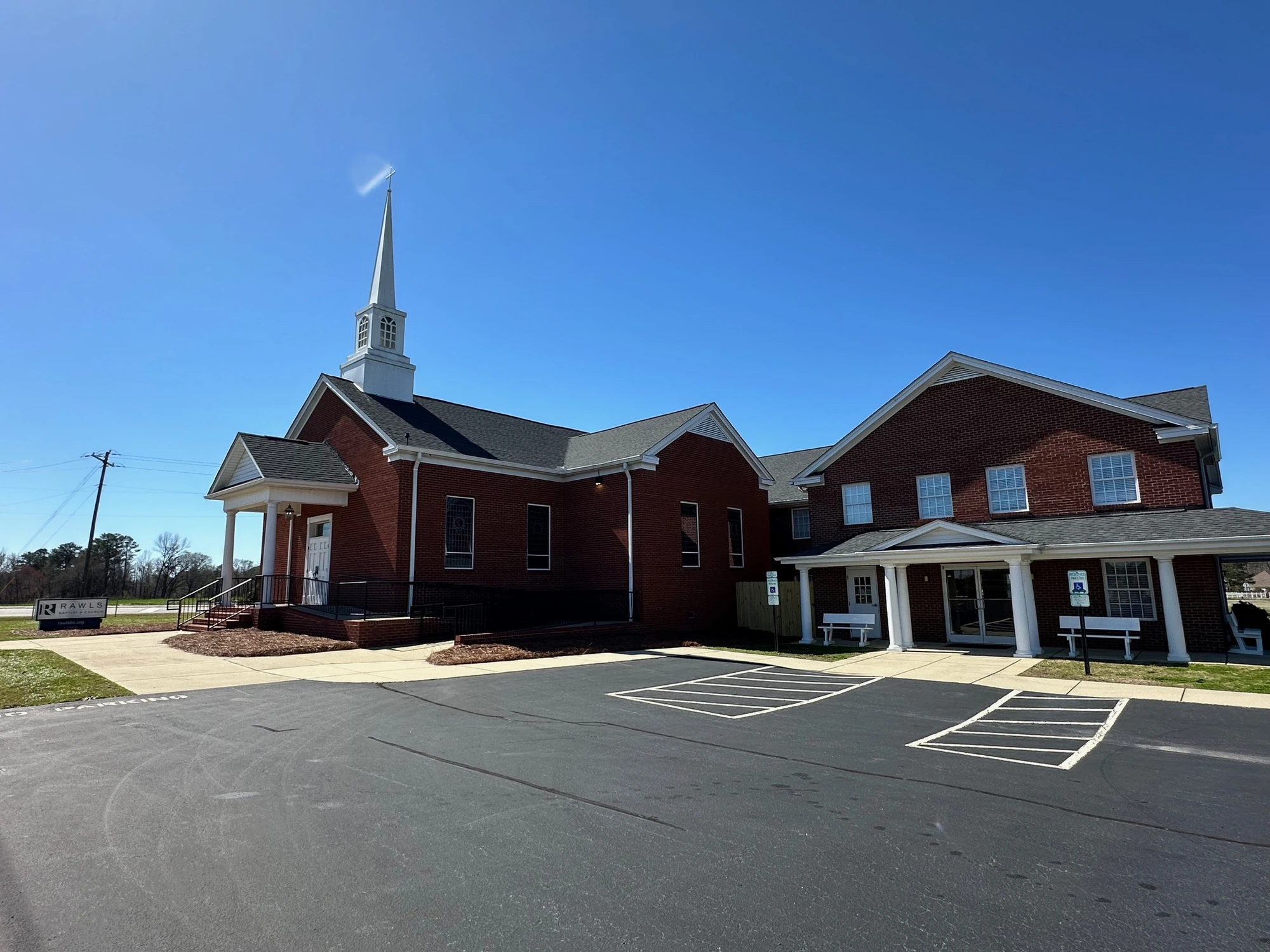 Exterior of Rawls Baptist Church and the surrounding church campus in Fuquay-Varina.