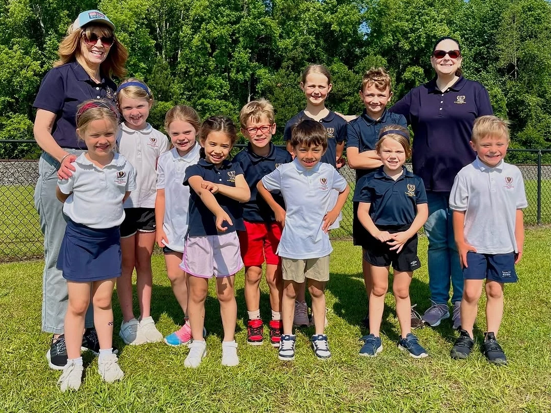 Students and teachers from Velos Classical Christian School together outside.