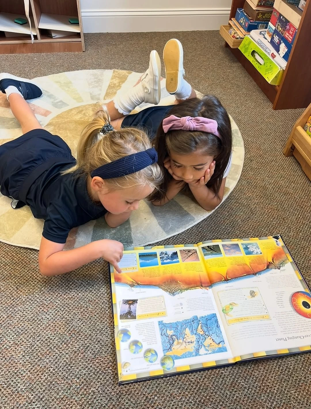 Velos students reading together during class.