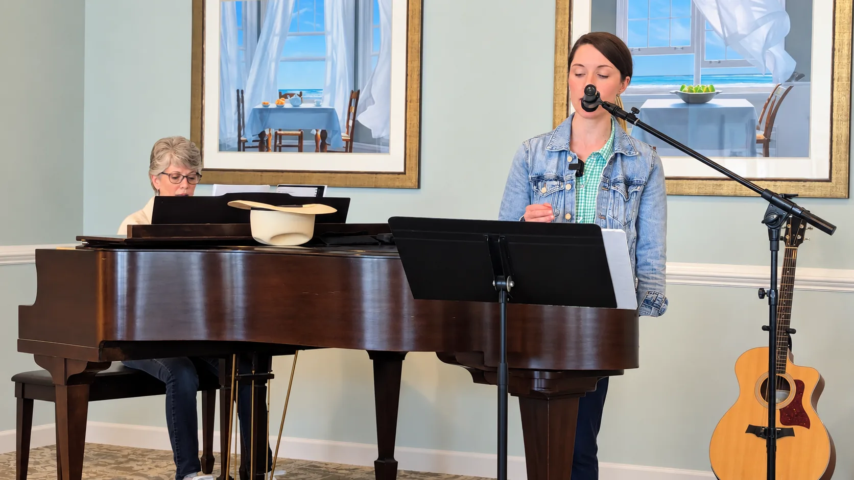 Susanna Gaster sharing music with residents at Calyx Living in Fuquay-Varina.