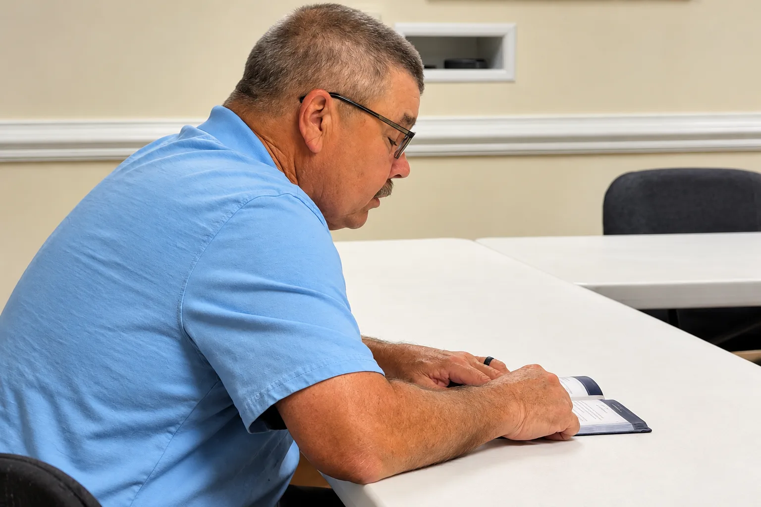 A man reading the Bible during Men’s Ministry at Rawls Baptist Church.